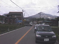 �E�ɋȂ���